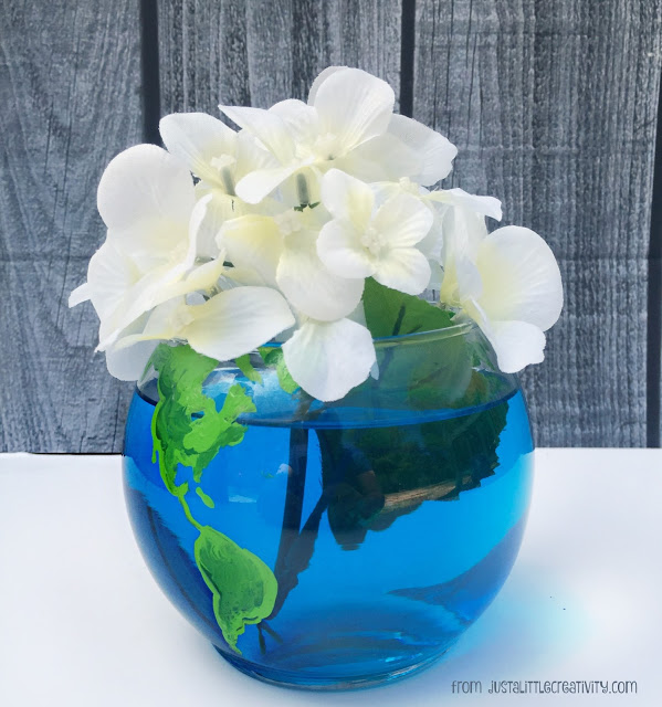 Glass paint on globe vase