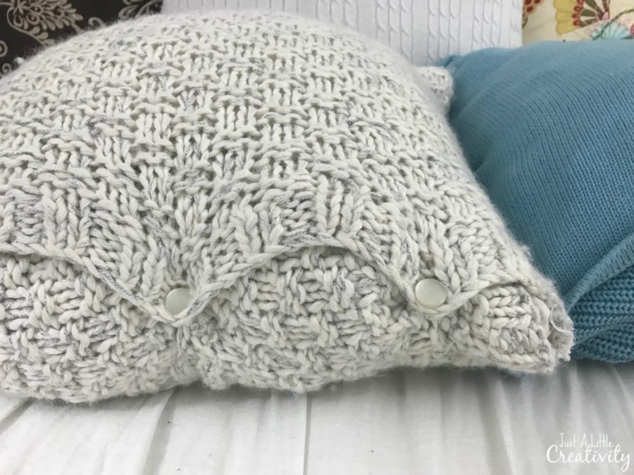 sew the buttons on the pillow