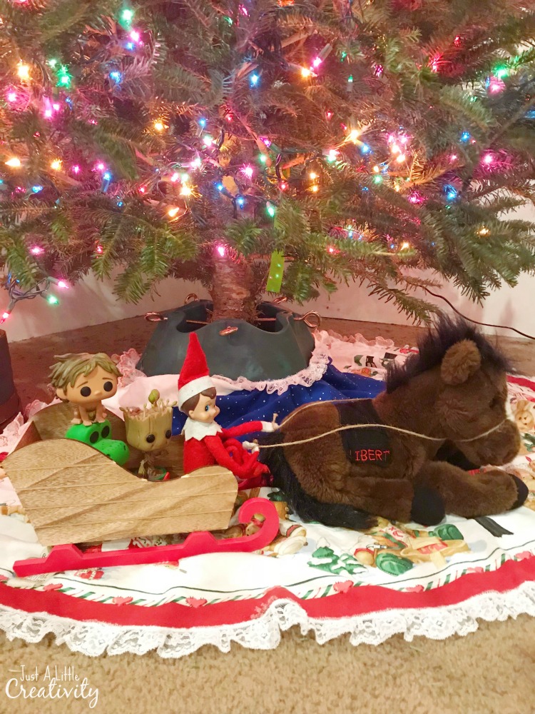 Elf on the shelf on a sleigh ride