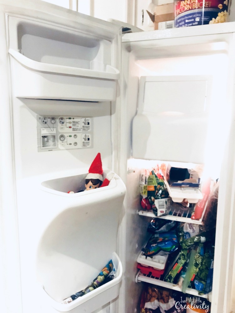 Elf on the shelf stuck in the ice maker again