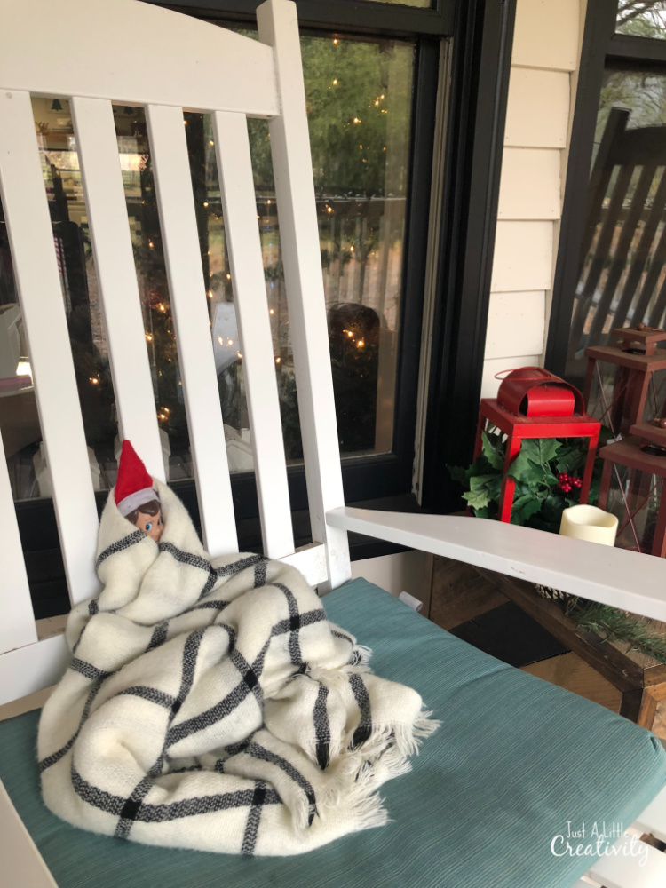 elf wrapped in a blanket