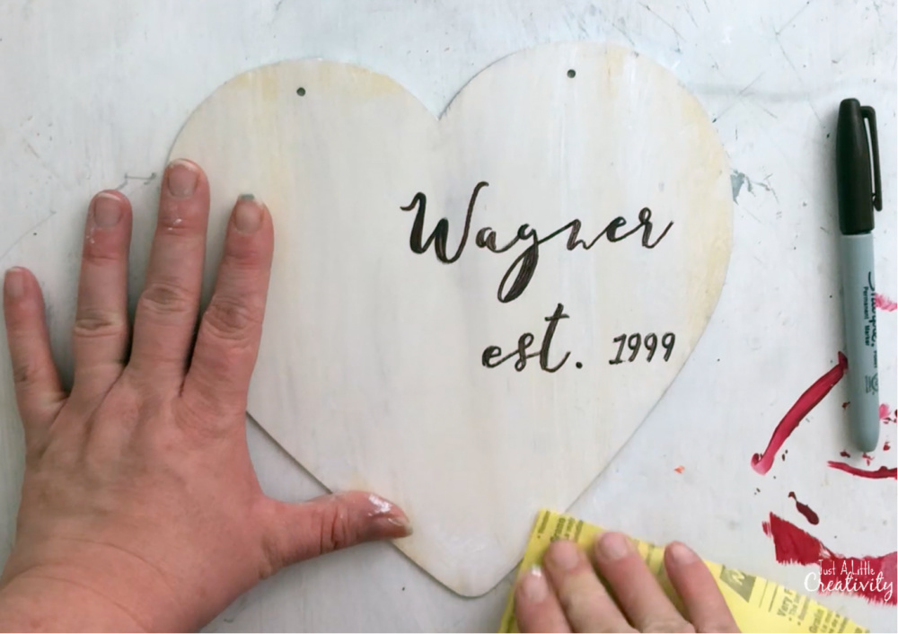 Distress farmhouse style hearts with sandpaper